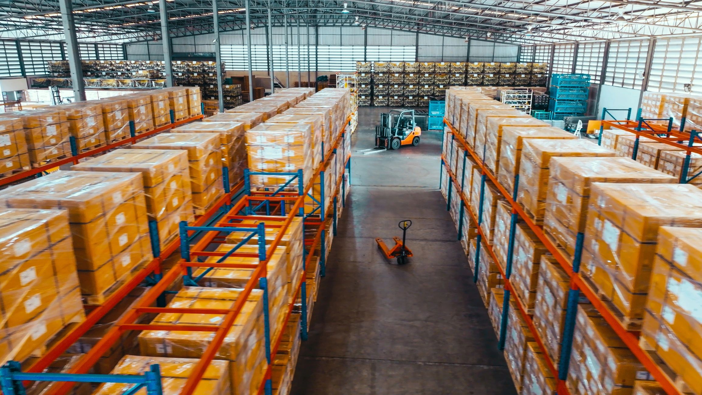 Warehouse shelves stocked with packaging boxes