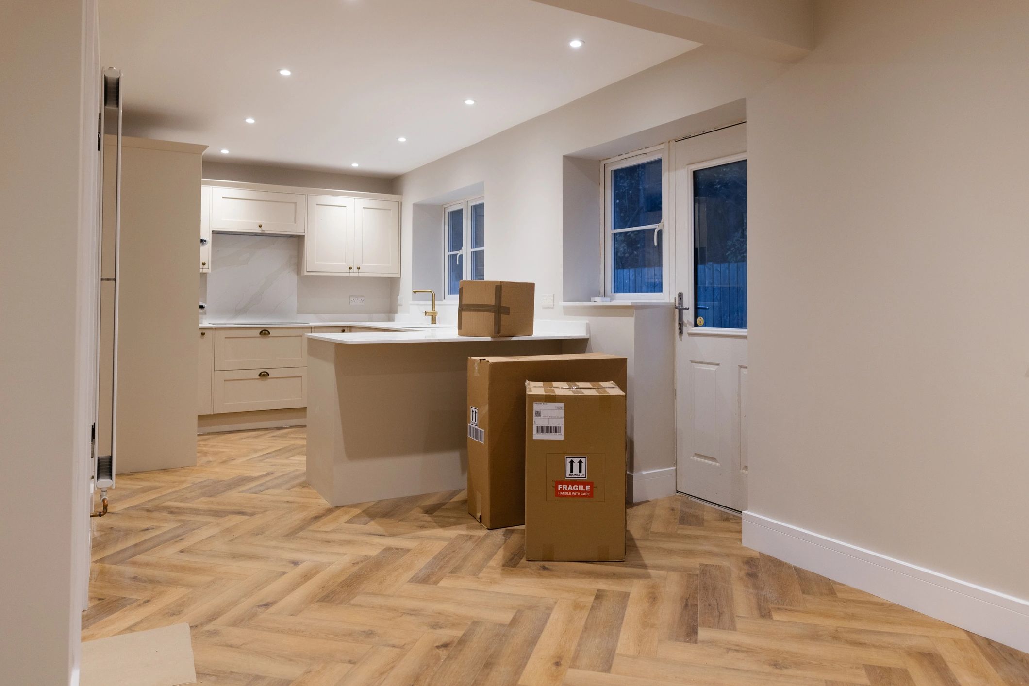 Stacked cardboard boxes representing product box solutions